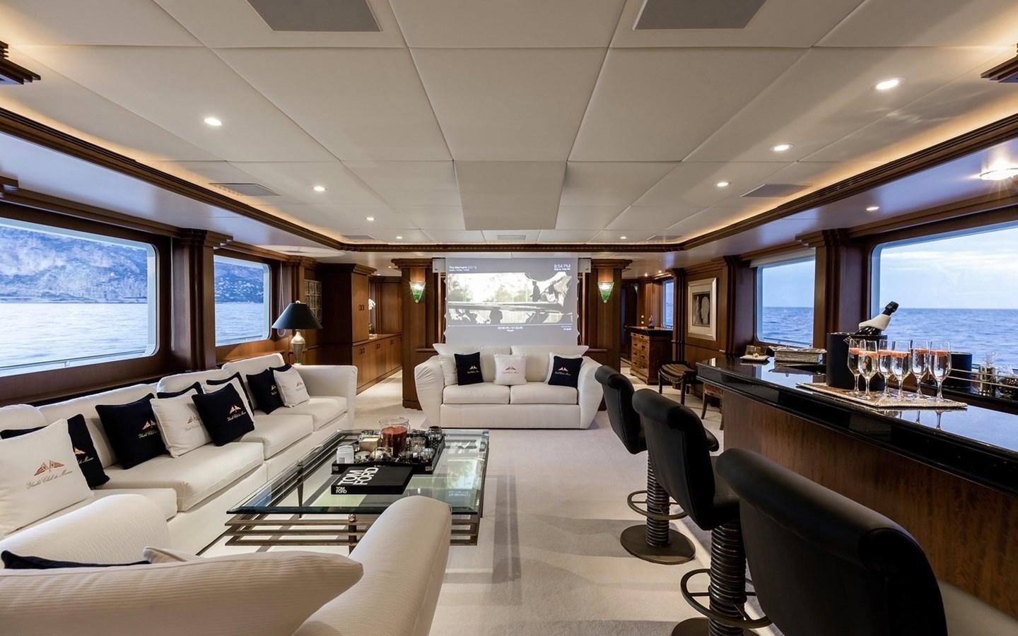 a living room with a large window aboard SIERRA 2 Yacht for Sale