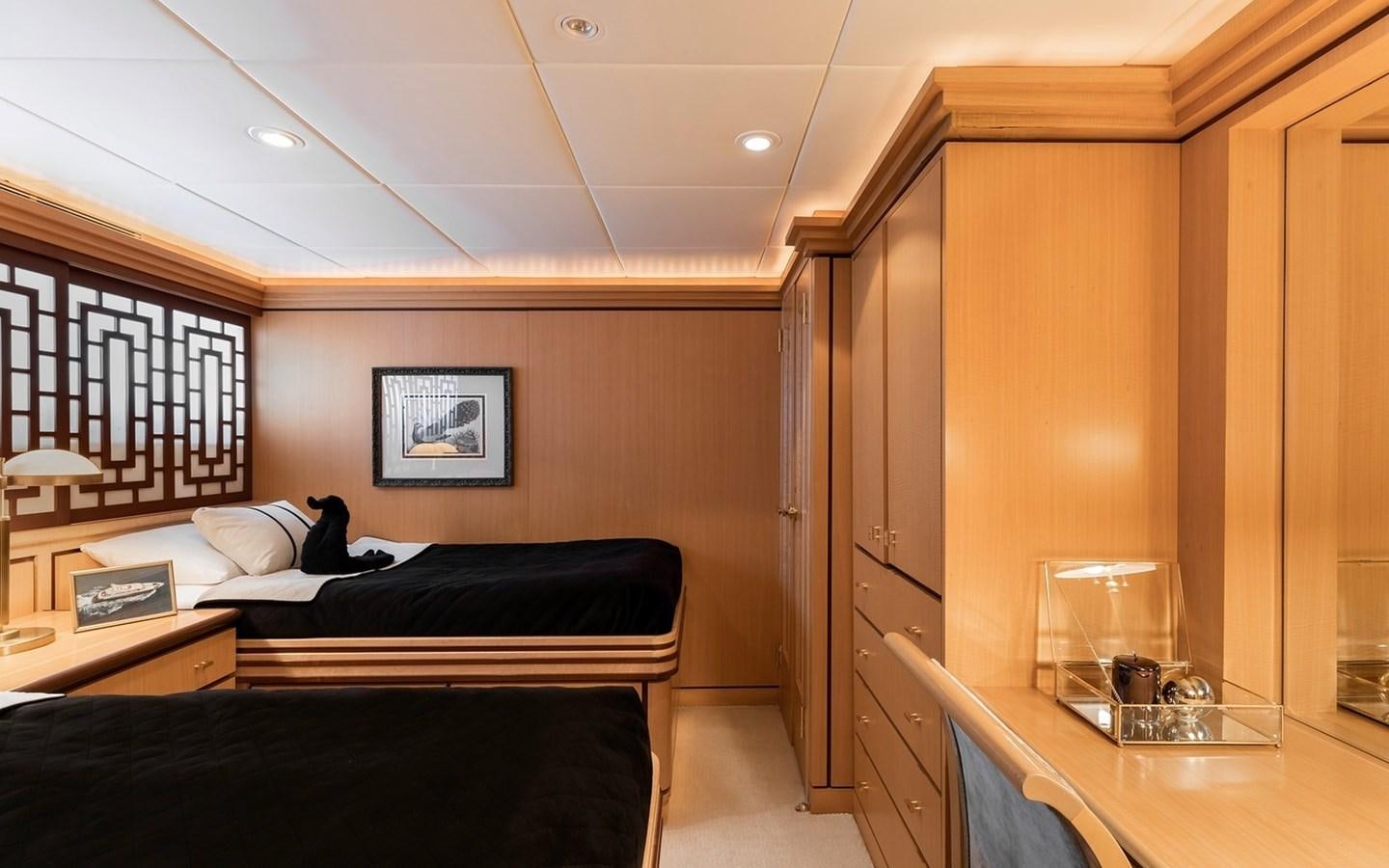 a room with a bed and a desk aboard SIERRA 2 Yacht for Sale