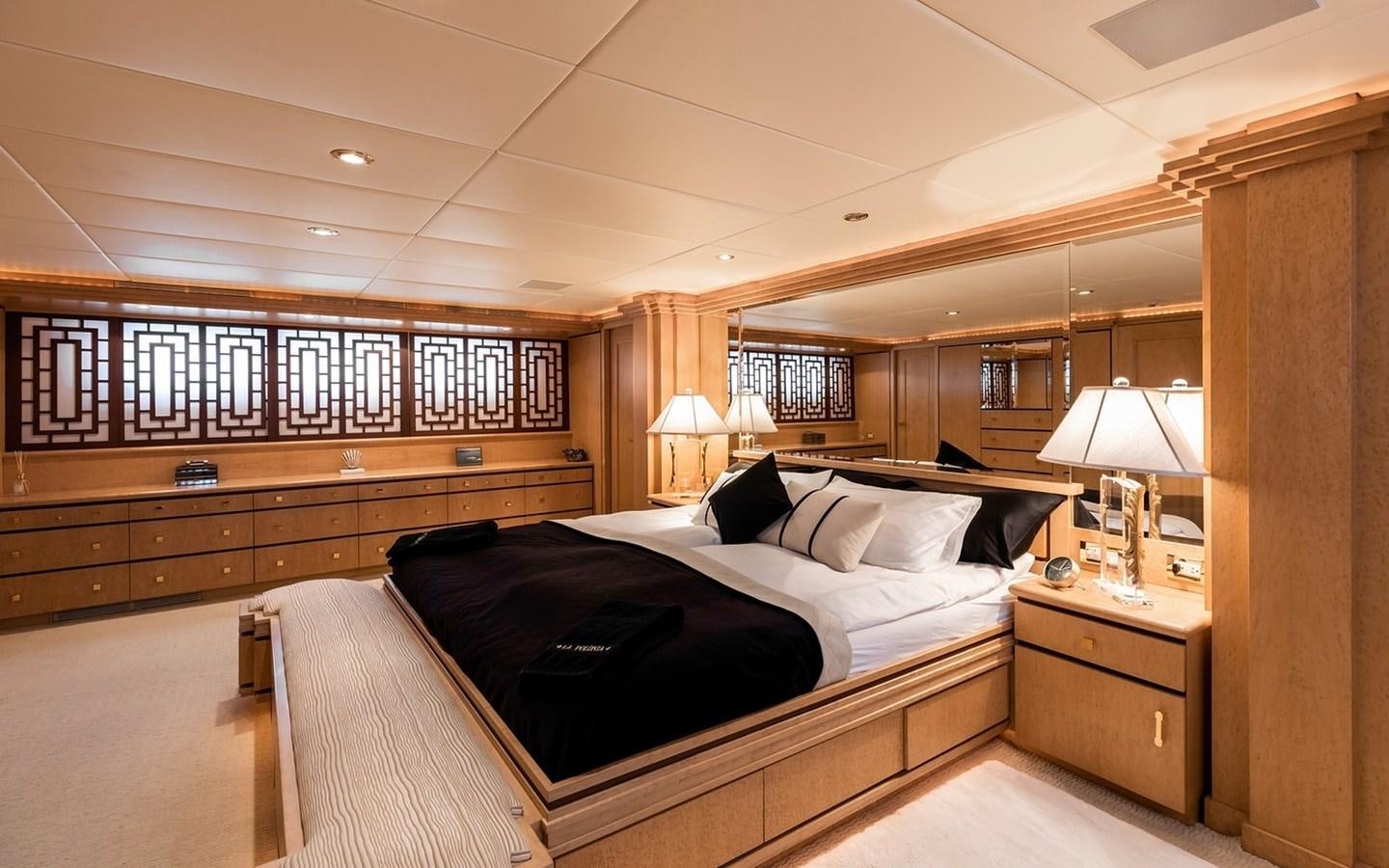 a room with a bed and a window aboard SIERRA 2 Yacht for Sale