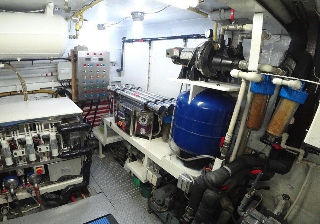 a room with several machines aboard AGA 6 Yacht for Sale