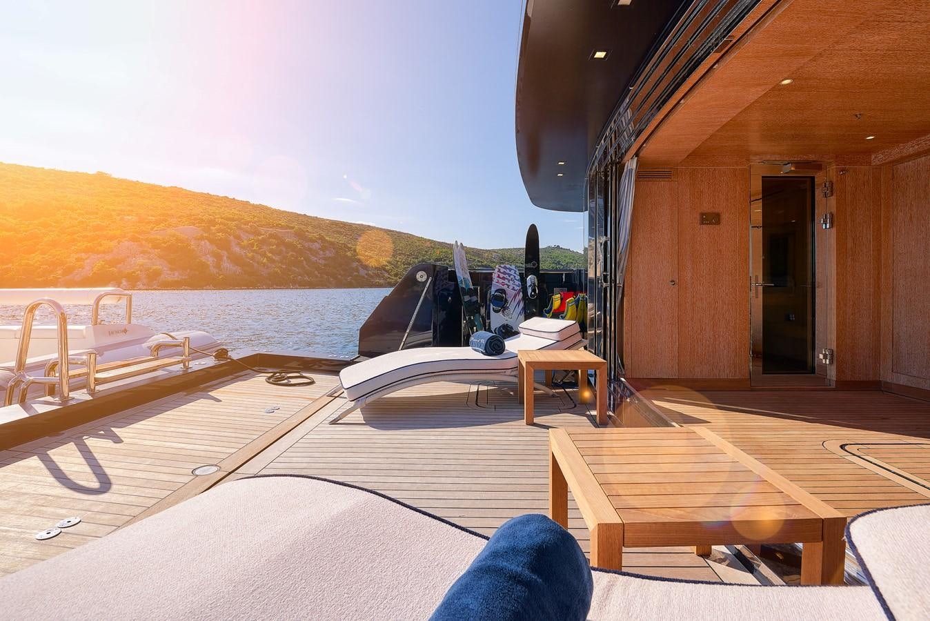 a boat on a deck aboard REVE D’OR Yacht for Sale