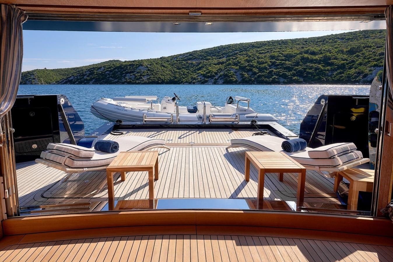 a deck with a group of boats on it aboard REVE D’OR Yacht for Sale
