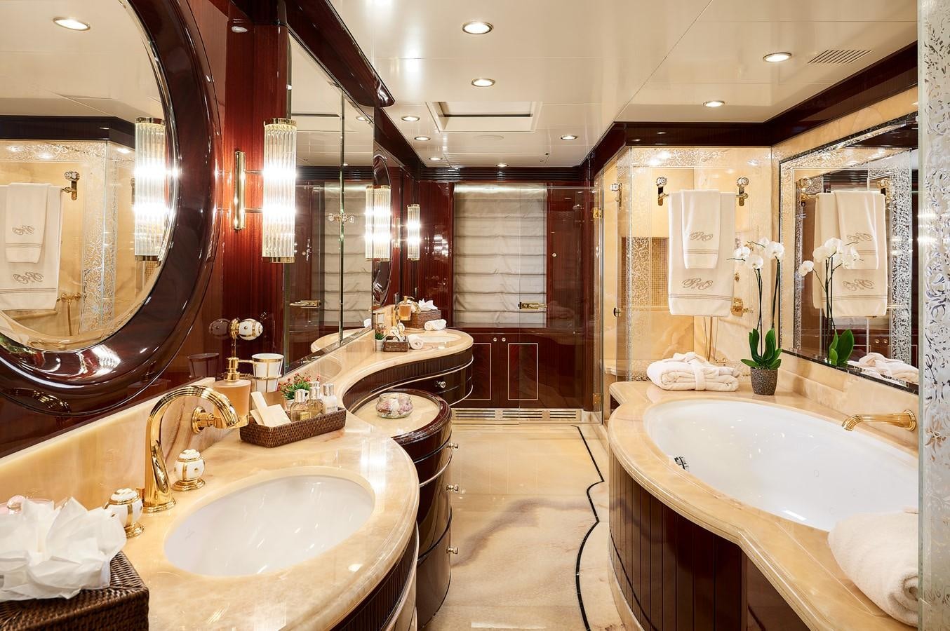 a bathroom with a large tub aboard REVE D’OR Yacht for Sale