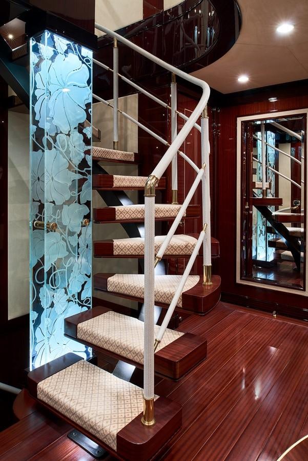 a staircase in a room aboard REVE D’OR Yacht for Sale