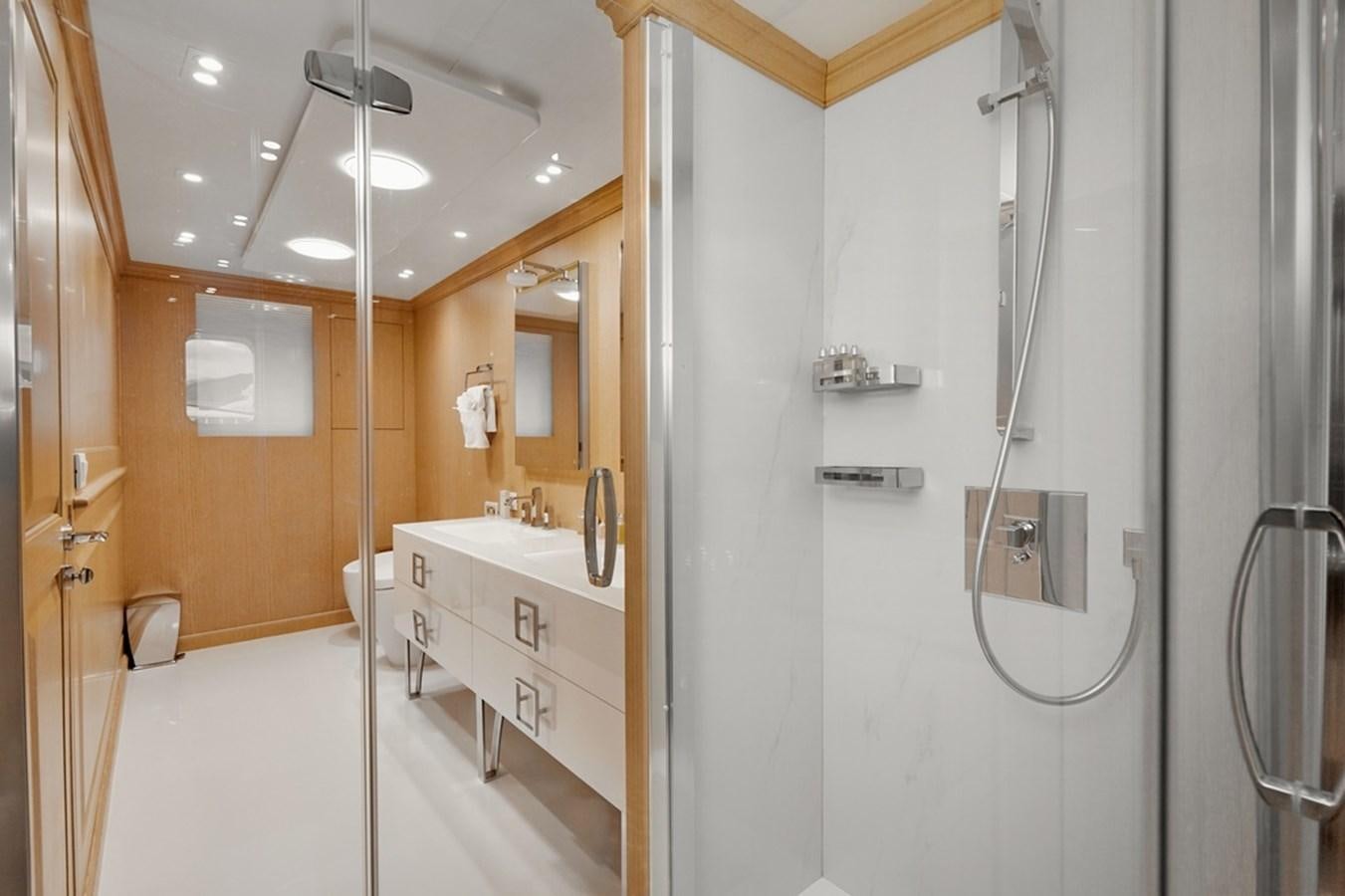 a bathroom with a shower unit and sink aboard DEEP STORY Yacht for Sale