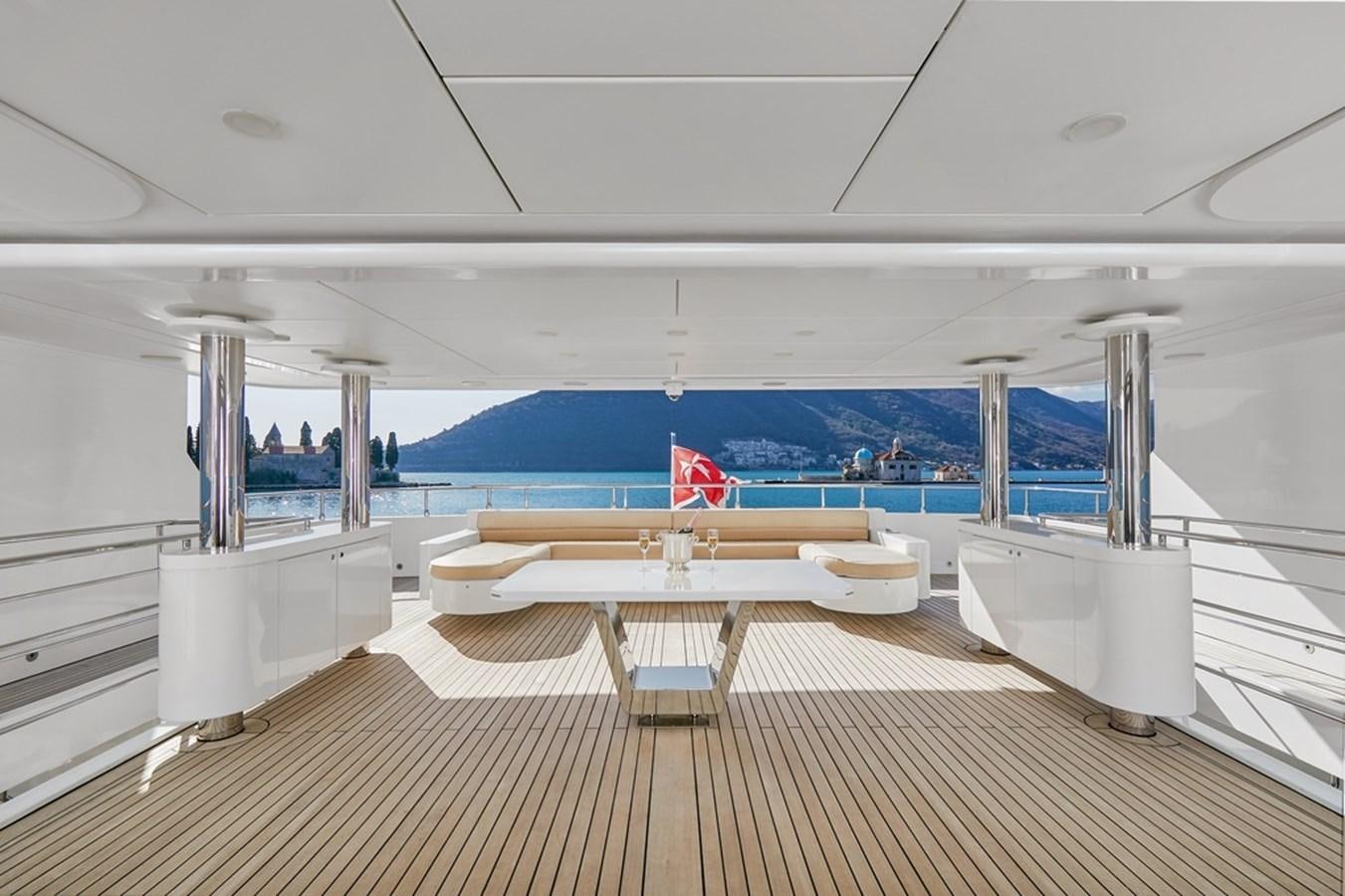 a room with a pool and a wood floor aboard DEEP STORY Yacht for Sale