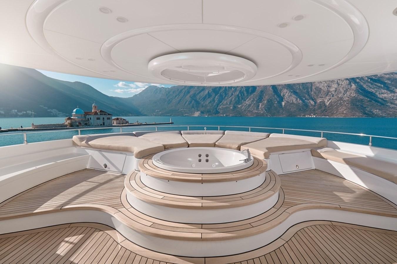 a large white bathtub with a large round white sink in it aboard DEEP STORY Yacht for Sale