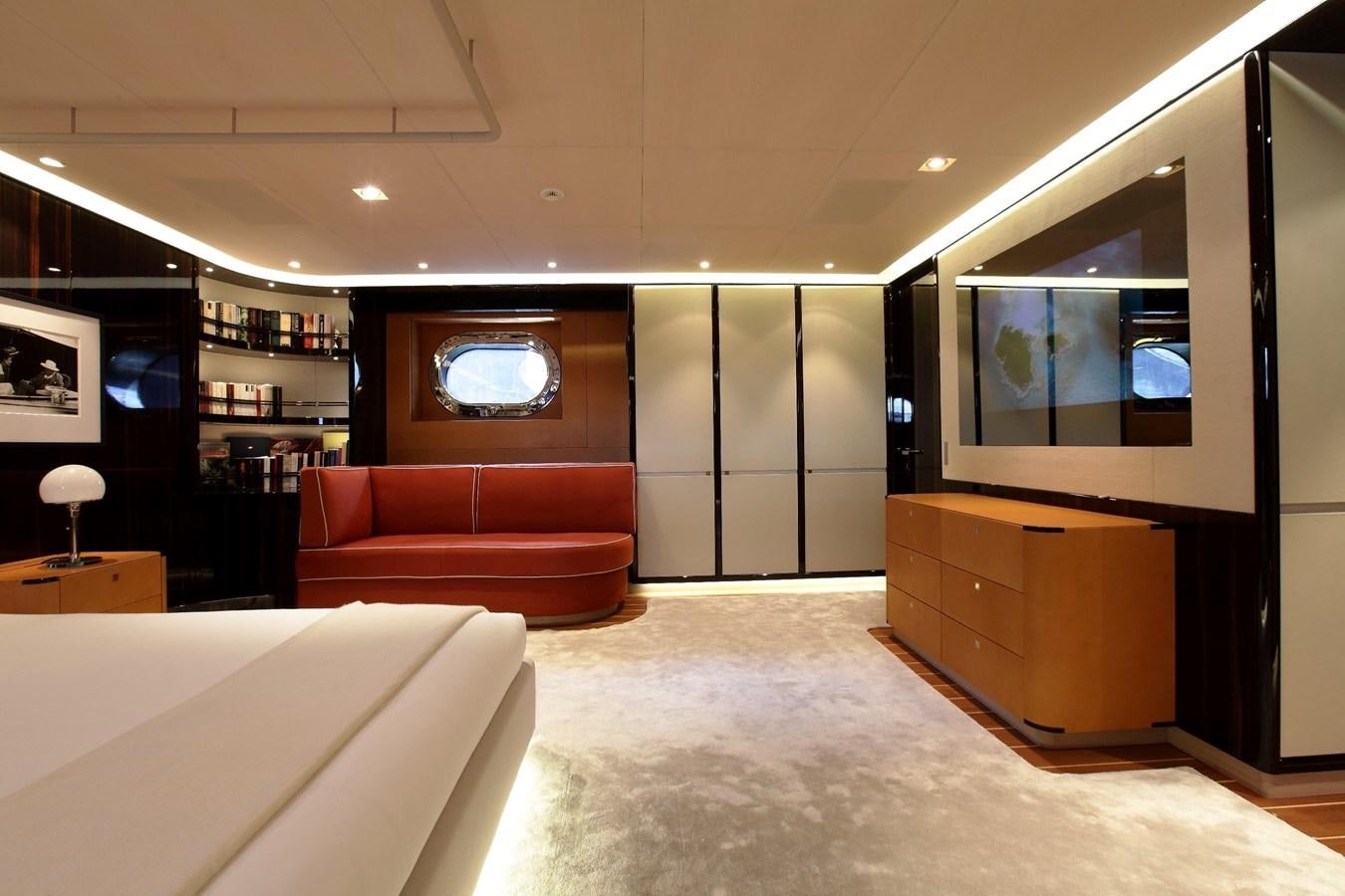 a room with a couch and a tv aboard SERENDIPITY I Yacht for Sale