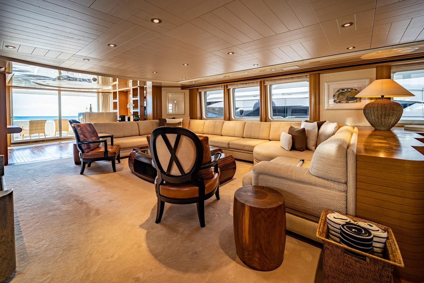 a living room with a couch and a table aboard KIJO Yacht for Charter