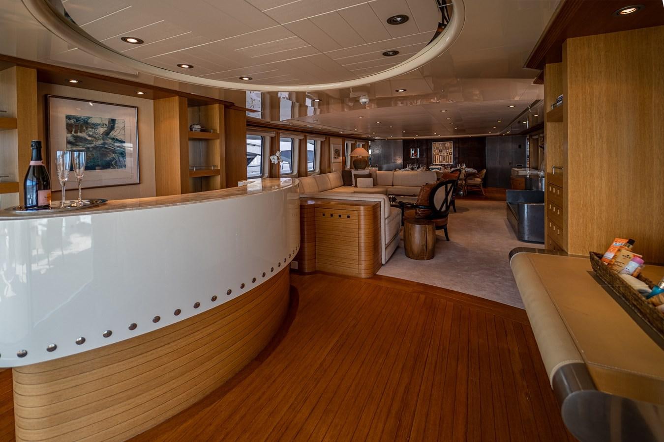 a large kitchen with a large island aboard KIJO Yacht for Charter