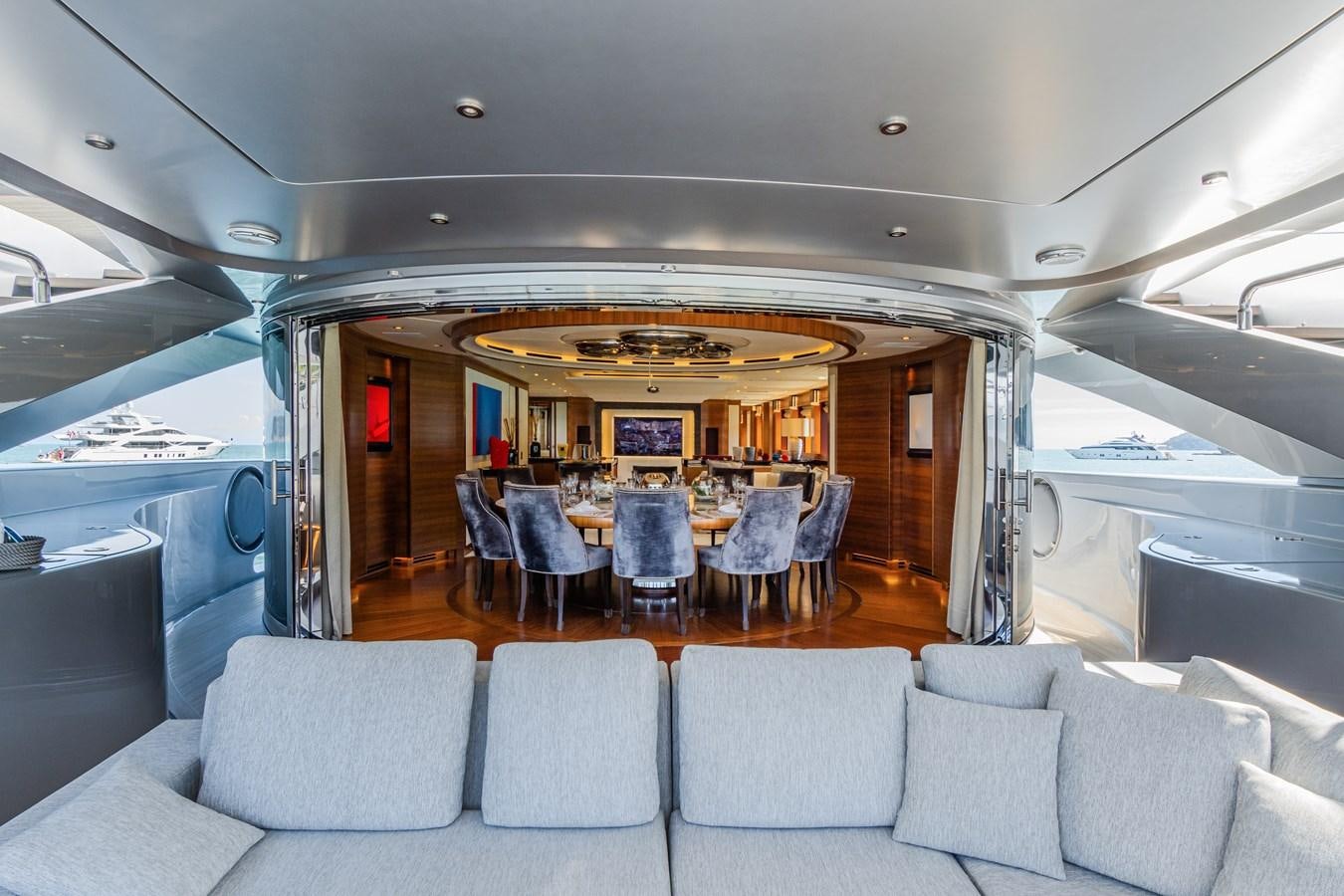 inside of a vehicle with a table and chairs and a large window aboard SILVER WIND Yacht for Sale