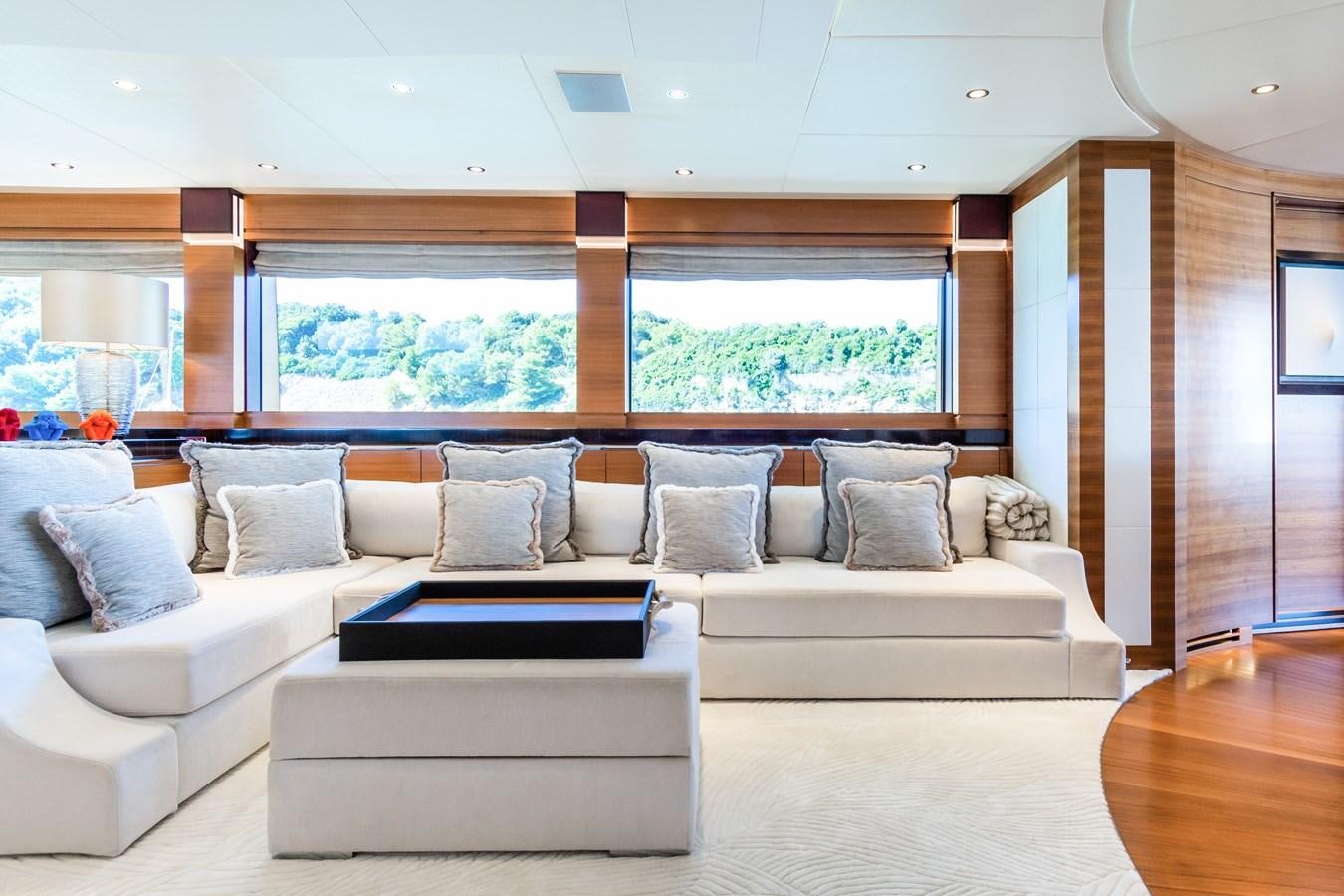 a living room with a large window aboard SILVER WIND Yacht for Sale