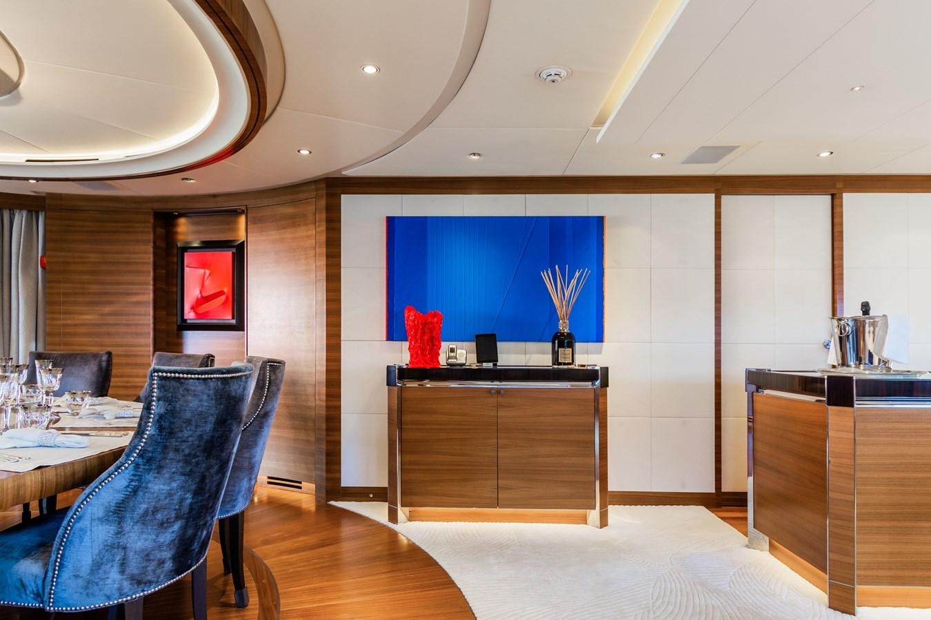 a room with a tv and a table and chairs aboard SILVER WIND Yacht for Sale