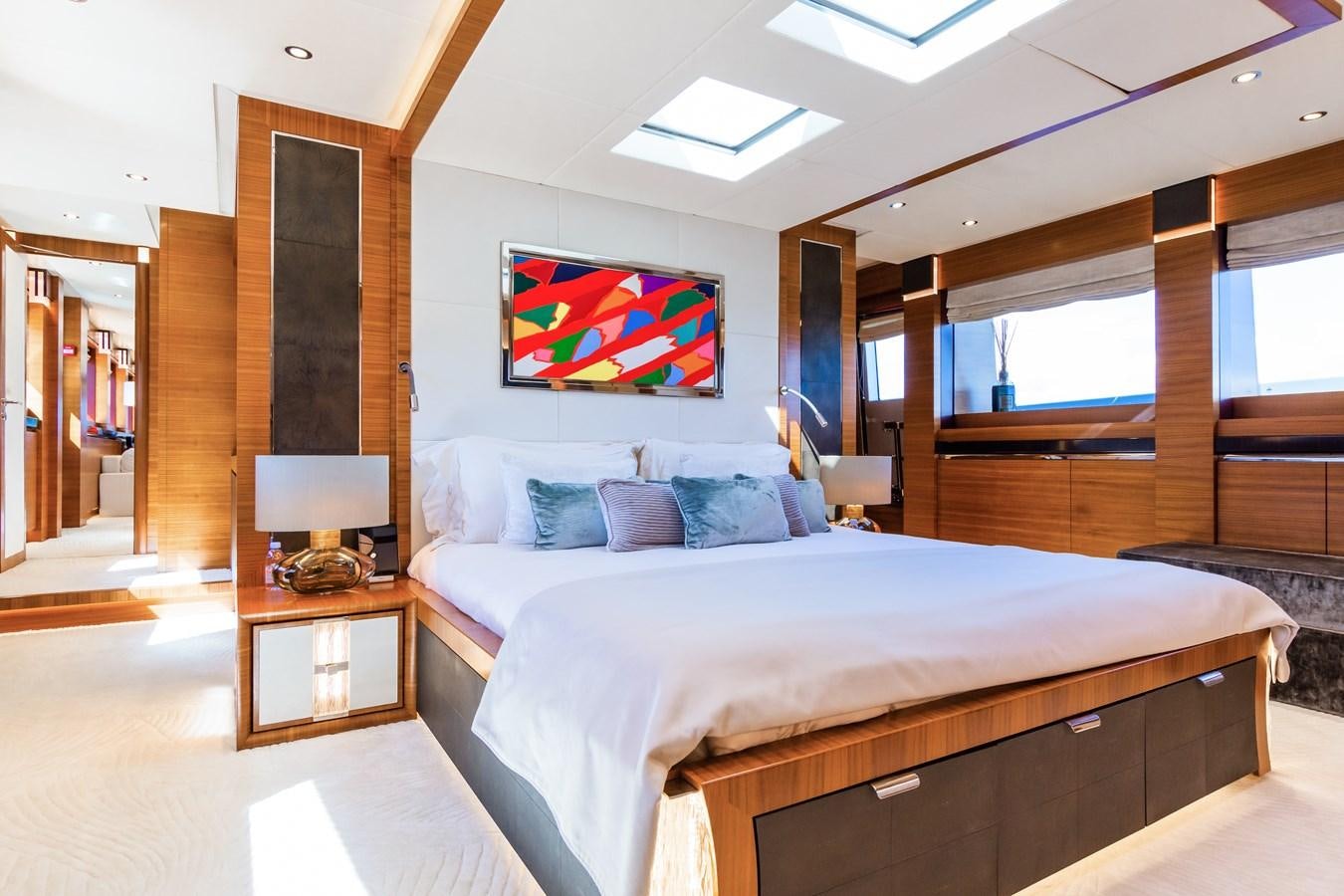 a bedroom with a large bed aboard SILVER WIND Yacht for Sale