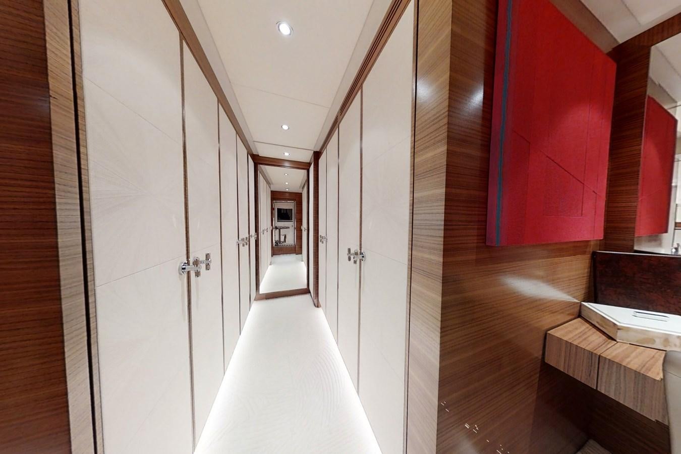 a hallway with a wood floor and white doors aboard SILVER WIND Yacht for Sale