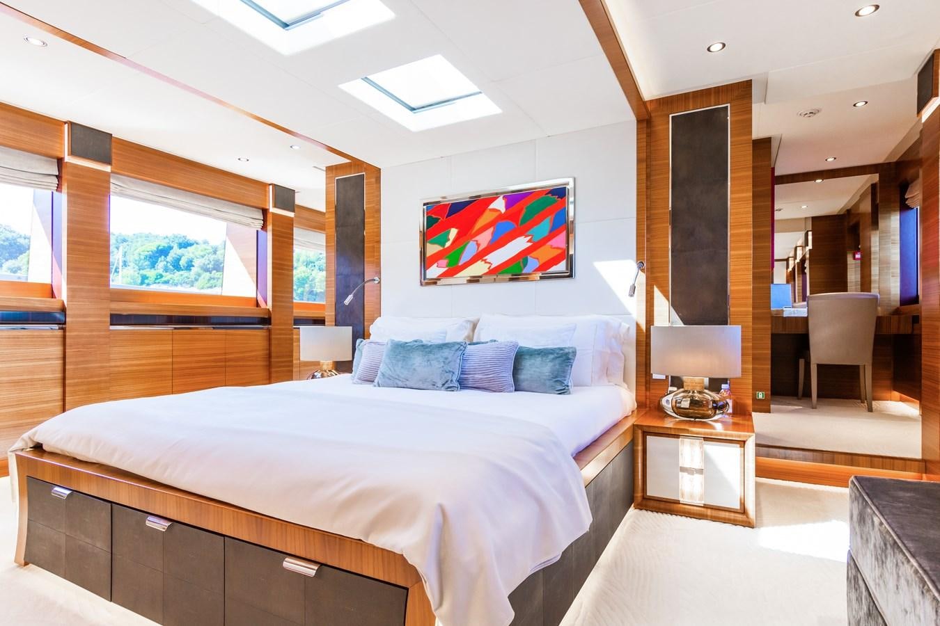 a bedroom with a large bed aboard SILVER WIND Yacht for Sale