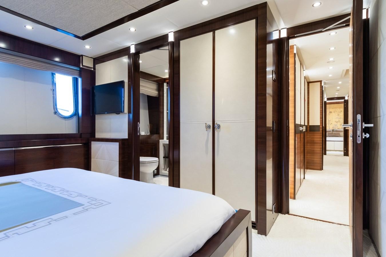 a room with a bed and a closet aboard SILVER WIND Yacht for Sale