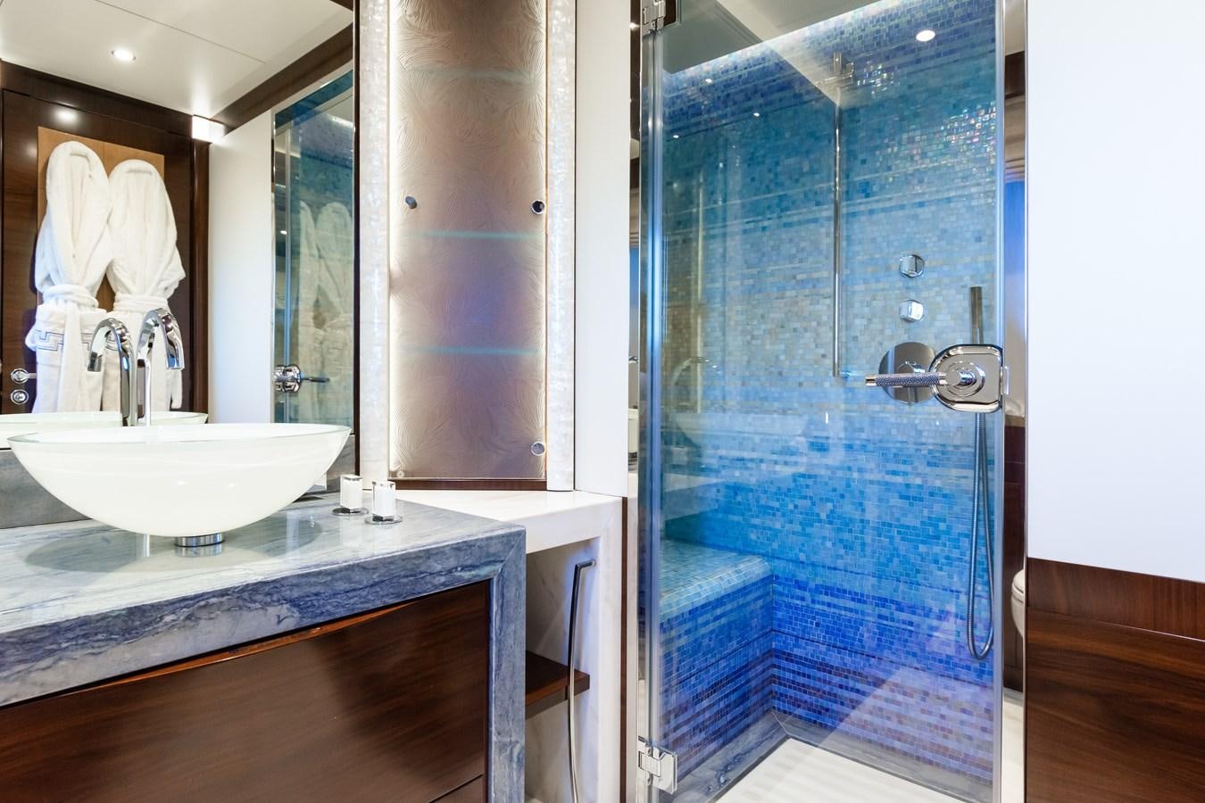 a bathroom with a glass shower aboard SILVER WIND Yacht for Sale