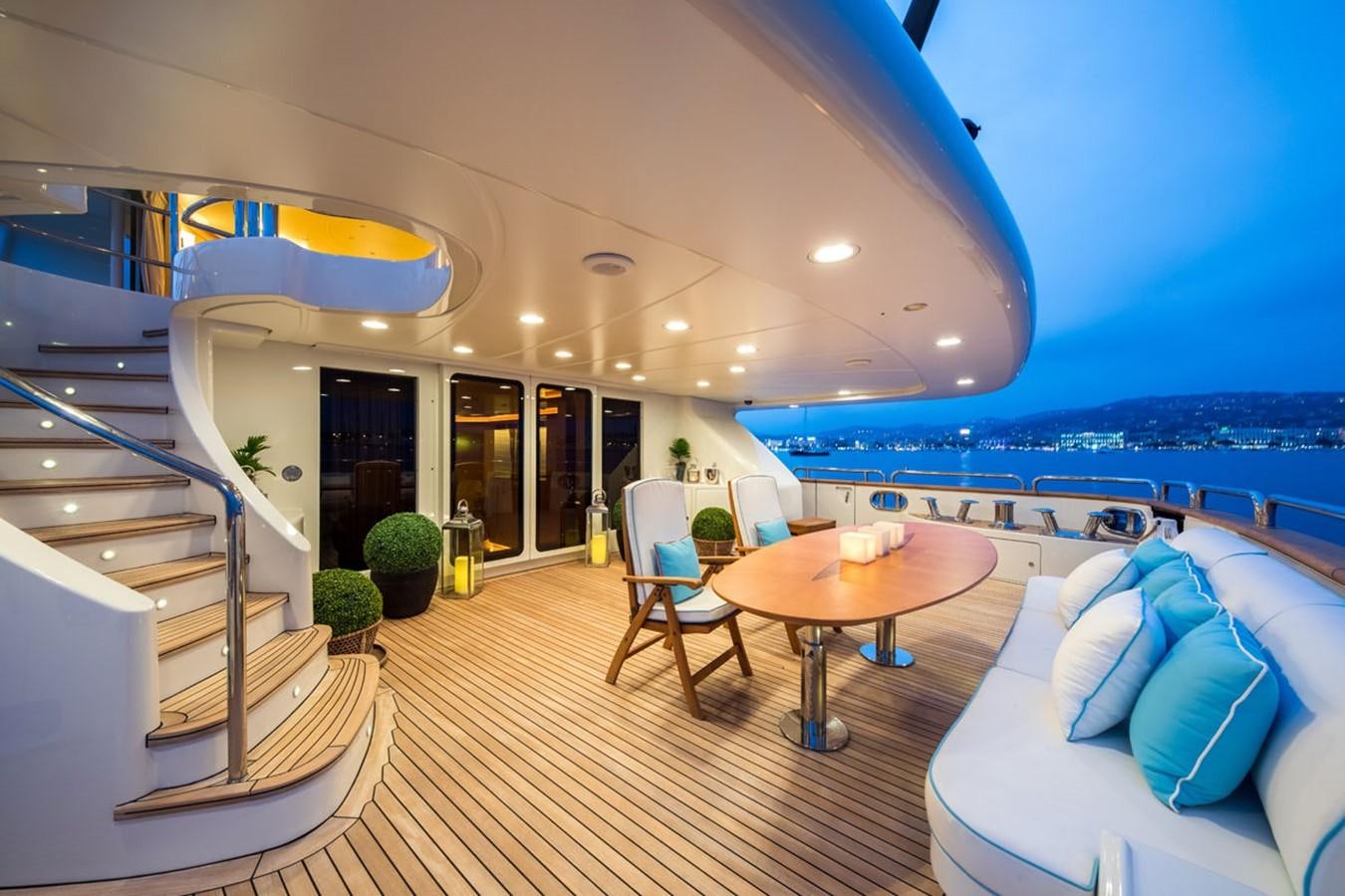 a large living room with a balcony overlooking the ocean aboard BLUE VISION Yacht for Sale
