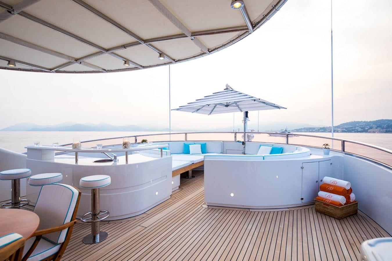a room with a table and chairs aboard BLUE VISION Yacht for Sale
