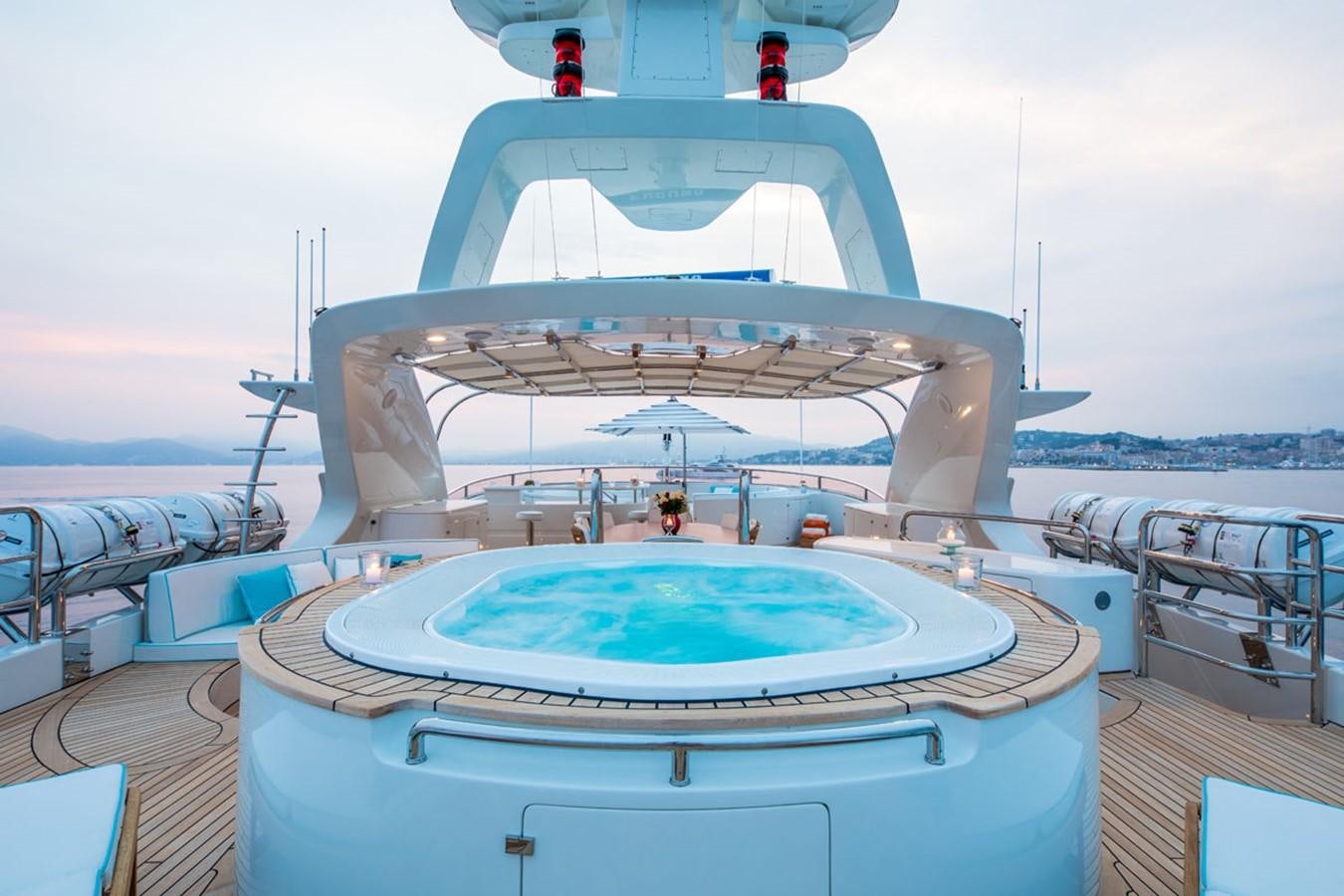 a large white boat with a large white round top and a blue circle on the front aboard BLUE VISION Yacht for Sale