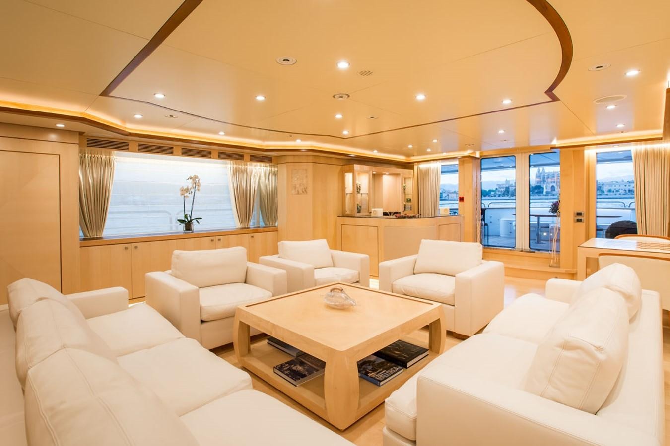 a living room with white couches aboard BLUE VISION Yacht for Sale