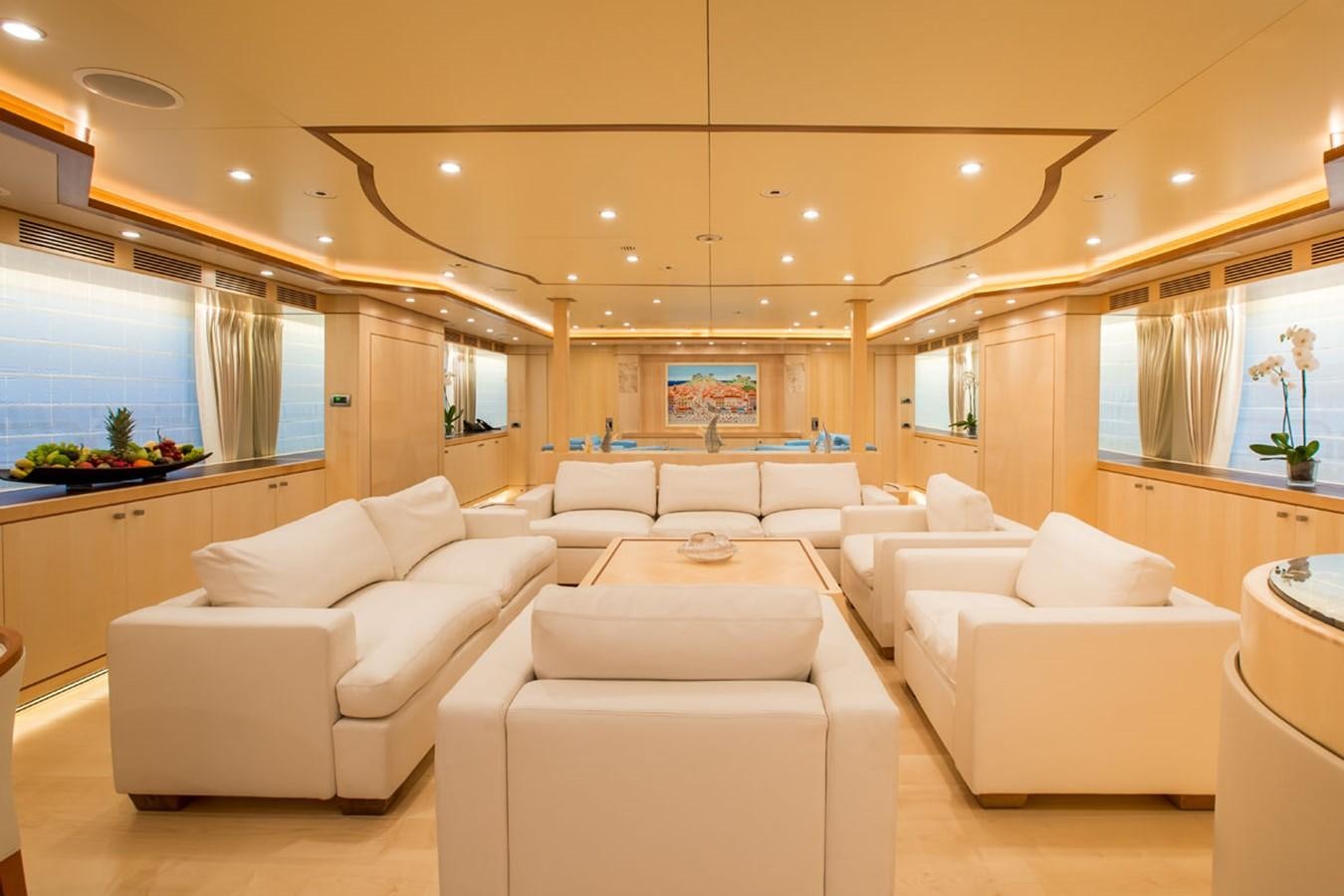 a living room with white couches aboard BLUE VISION Yacht for Sale