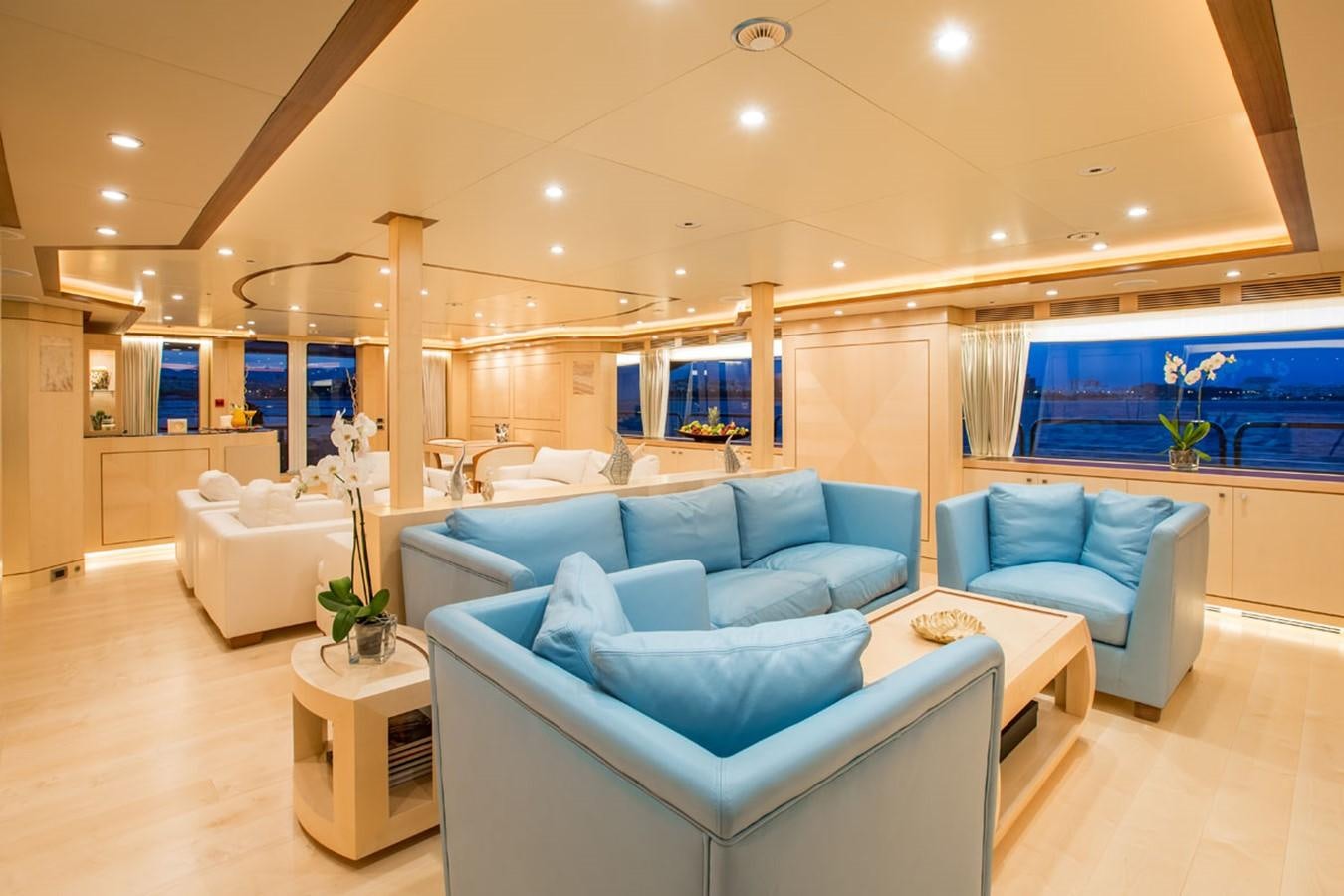 a living room with a large window aboard BLUE VISION Yacht for Sale