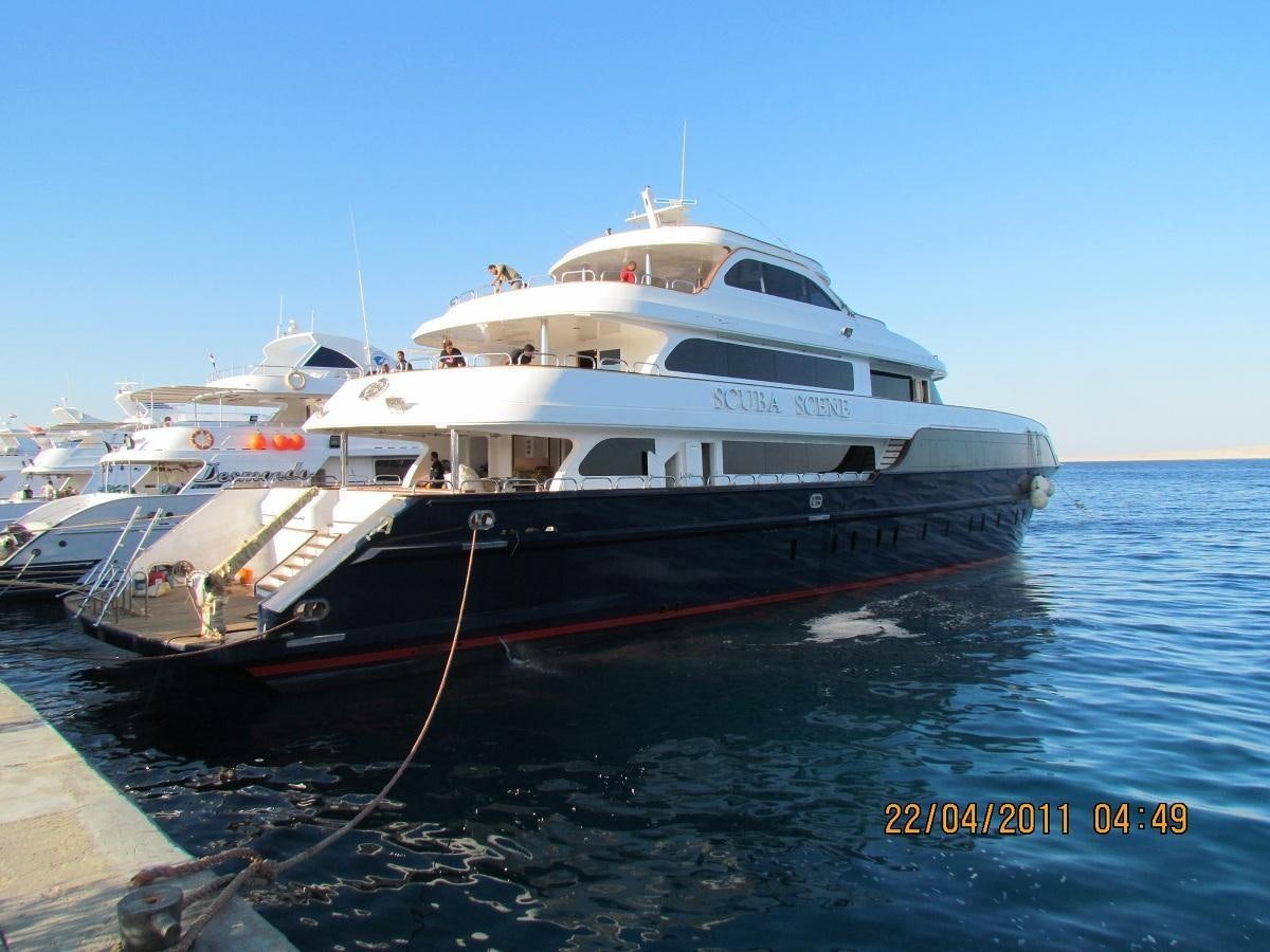 a large white boat aboard SCUBA SCENE Yacht for Sale