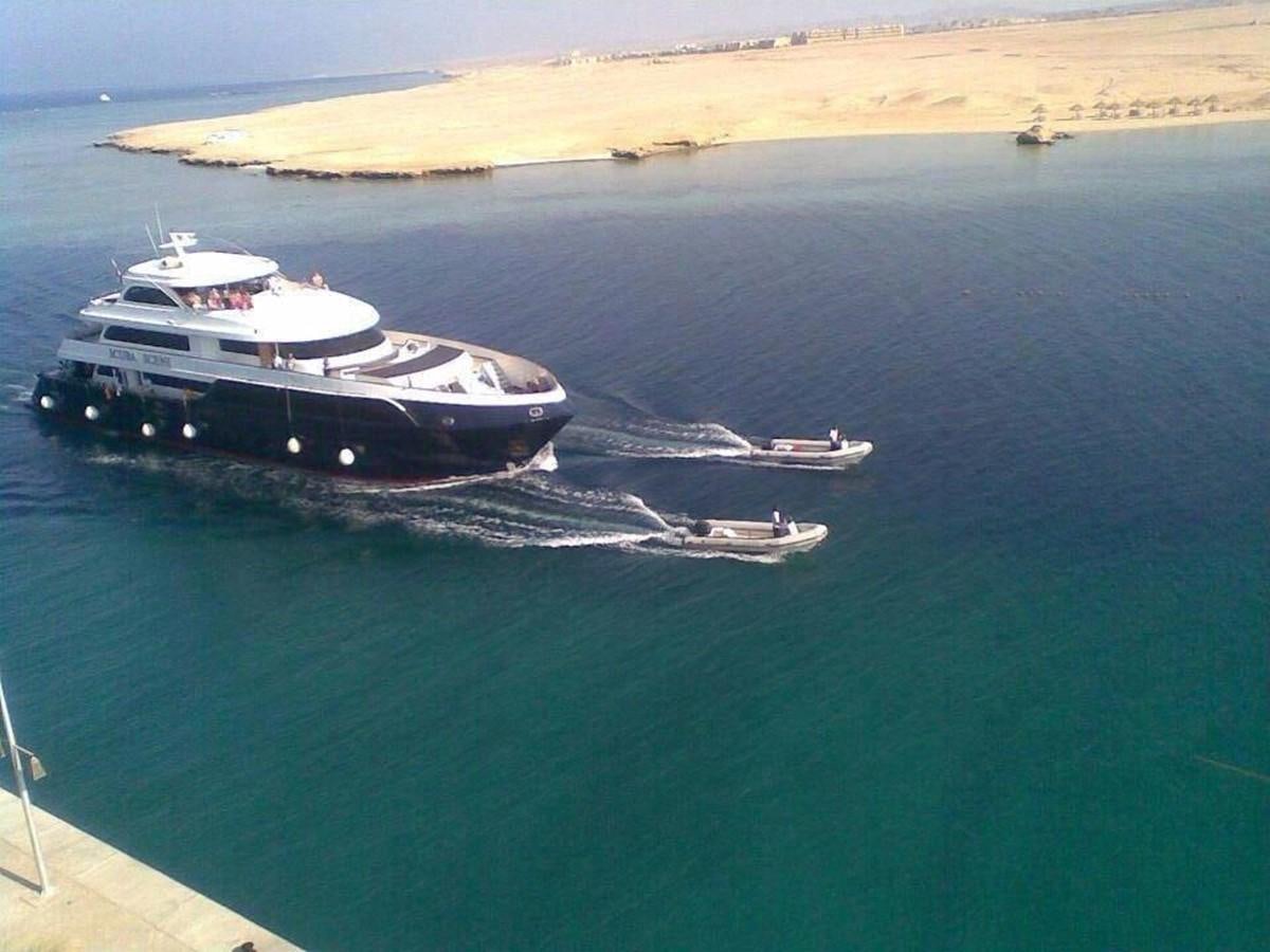 a boat on the water aboard SCUBA SCENE Yacht for Sale