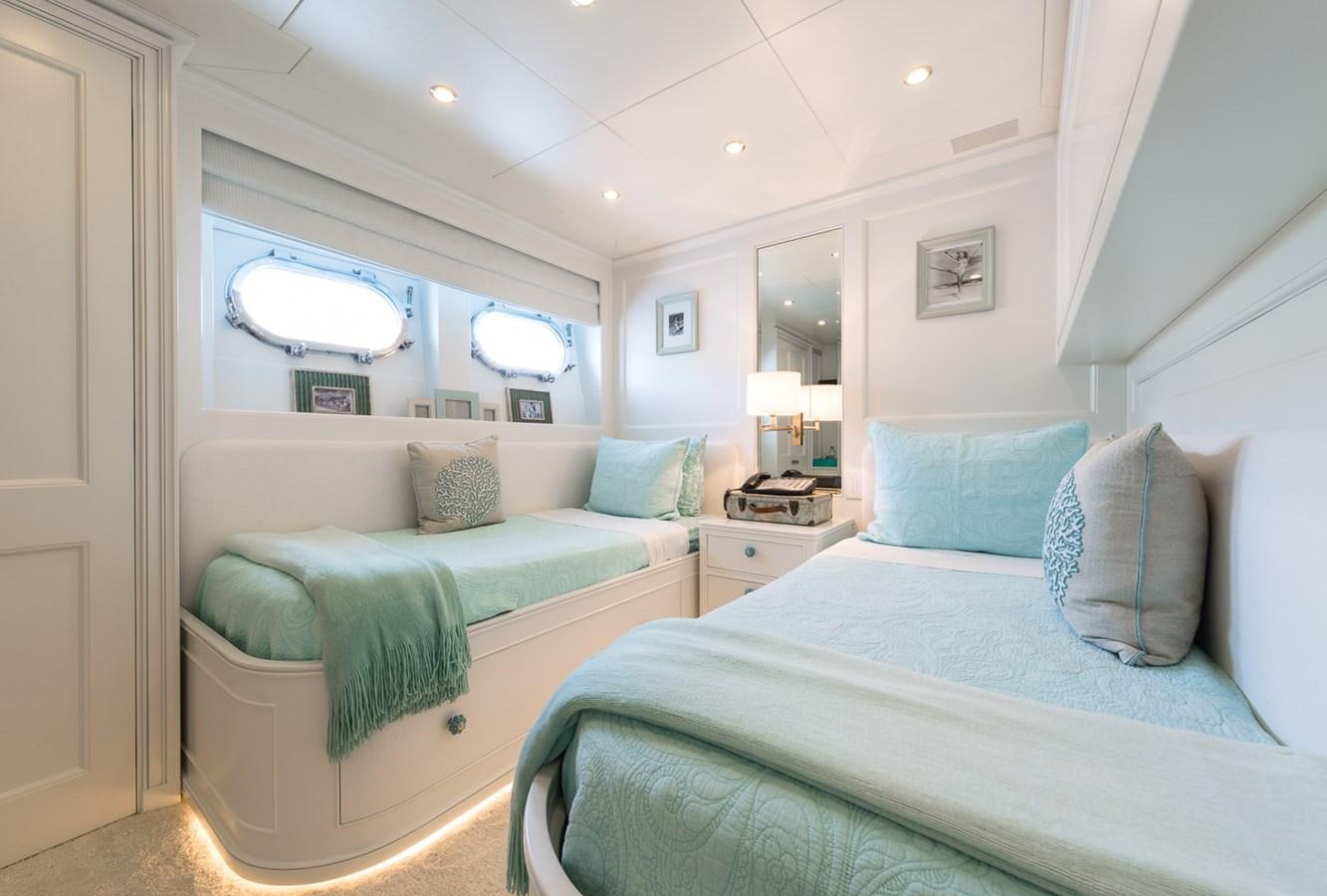 a couple of beds in a room aboard BINA Yacht for Sale