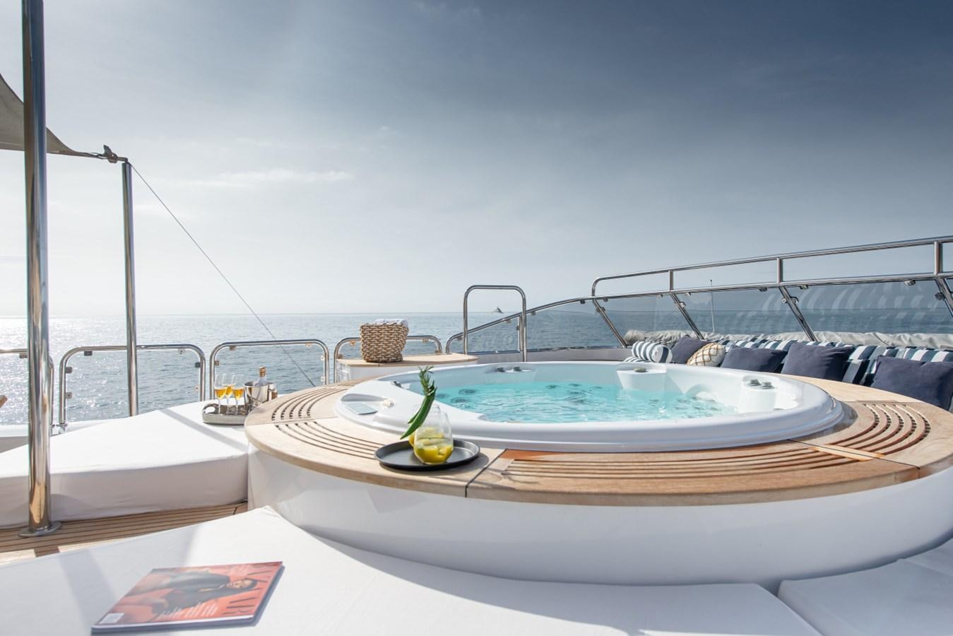 a table with a plate on it aboard BINA Yacht for Sale
