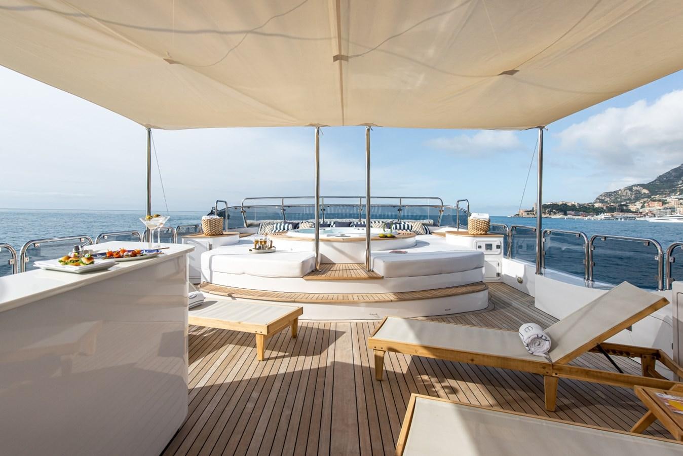 a boat on a deck aboard BINA Yacht for Sale