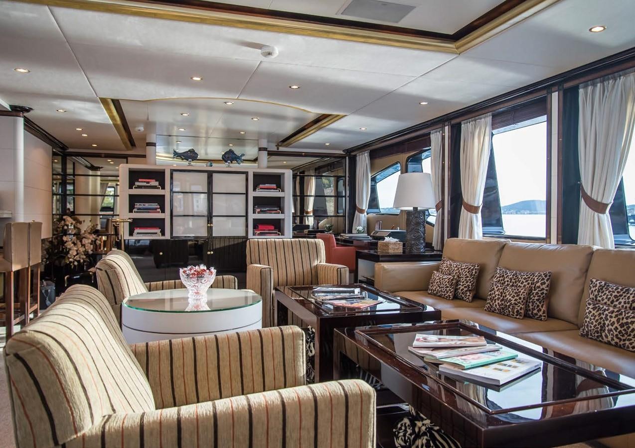 a living room with a couch and a coffee table aboard DIANE Yacht for Sale