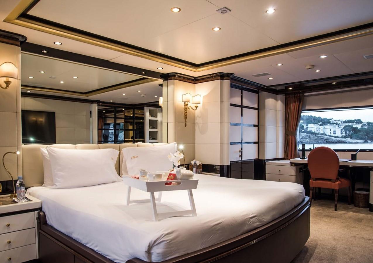 a large bed in a room aboard DIANE Yacht for Sale