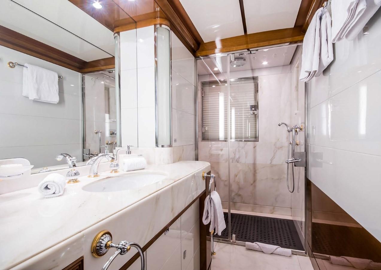 a bathroom with a sink and a mirror aboard DIANE Yacht for Sale