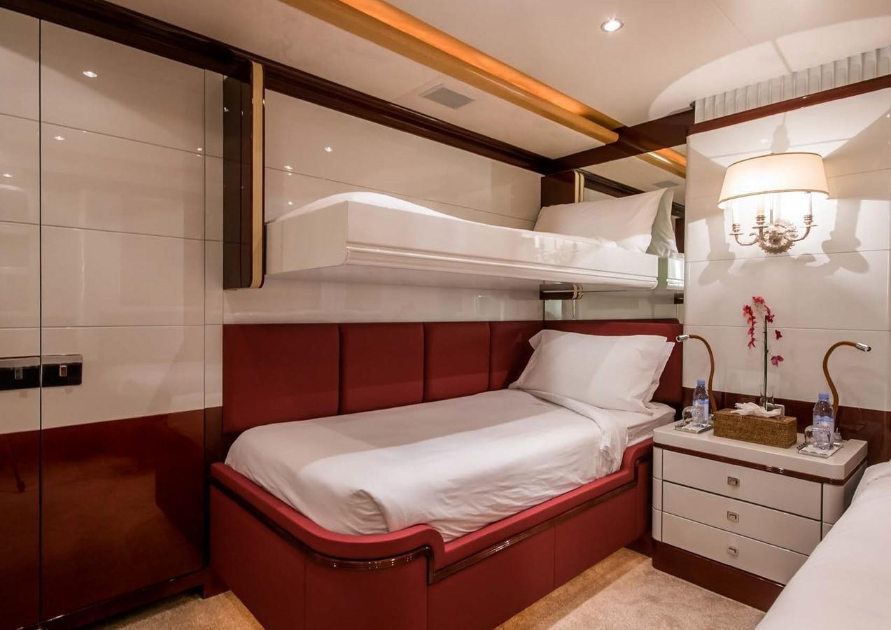 a room with a bed and a sink aboard DIANE Yacht for Sale