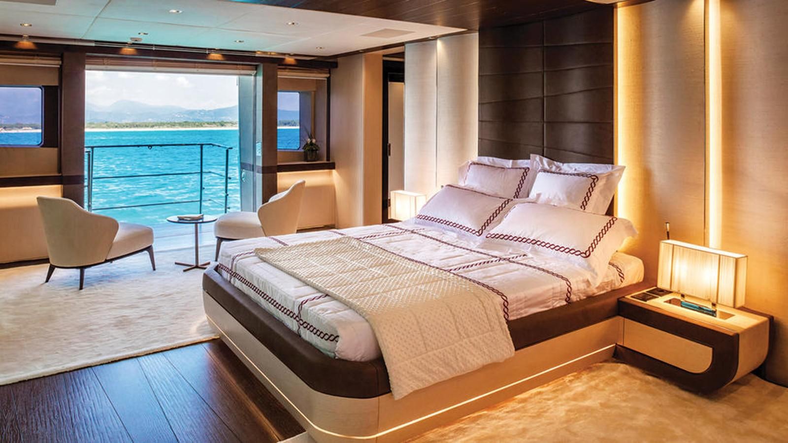 a large bed in a room aboard NAMASTE Yacht for Charter