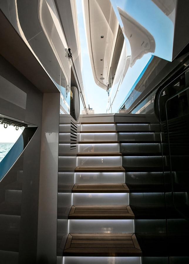a staircase with a blue light aboard NAMASTE Yacht for Charter
