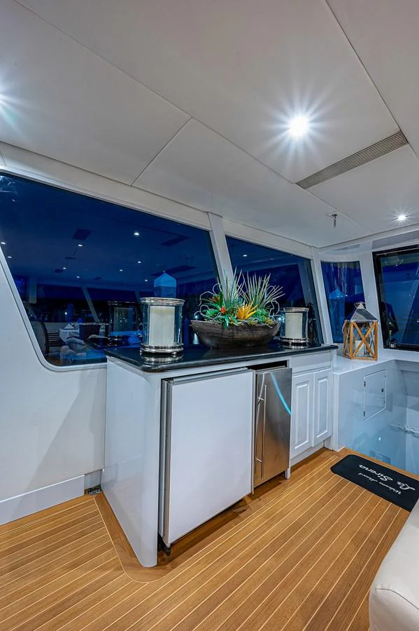 a kitchen with a large island aboard LA SIRENA Yacht for Sale