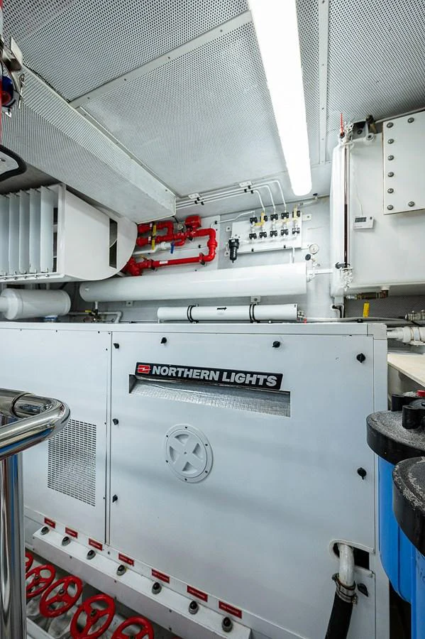 a white machine with red buttons aboard LA SIRENA Yacht for Sale