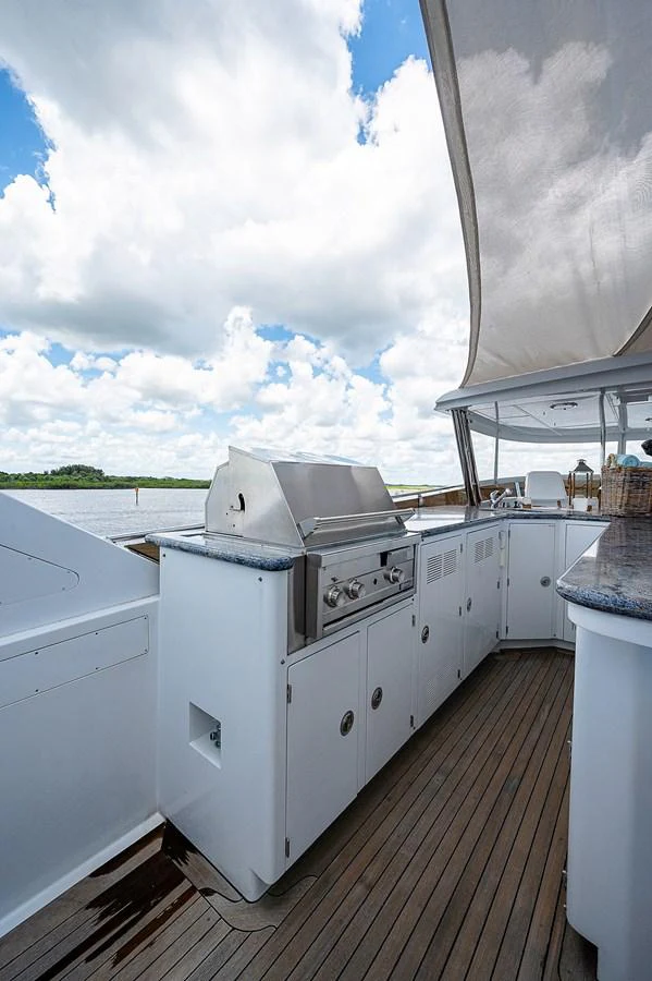 a kitchen with a large window aboard LA SIRENA Yacht for Sale