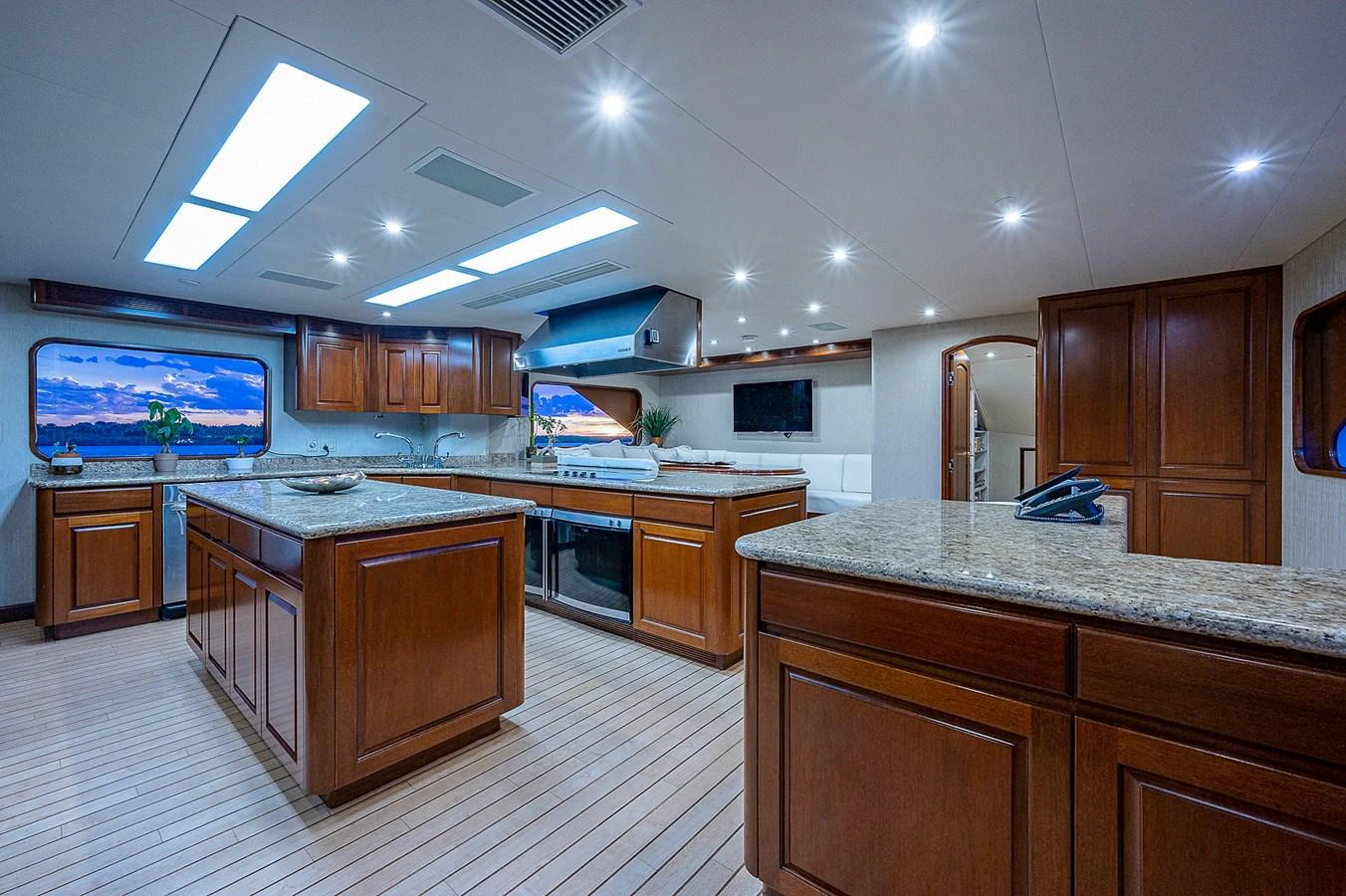 a large kitchen with a large island aboard LA SIRENA Yacht for Sale