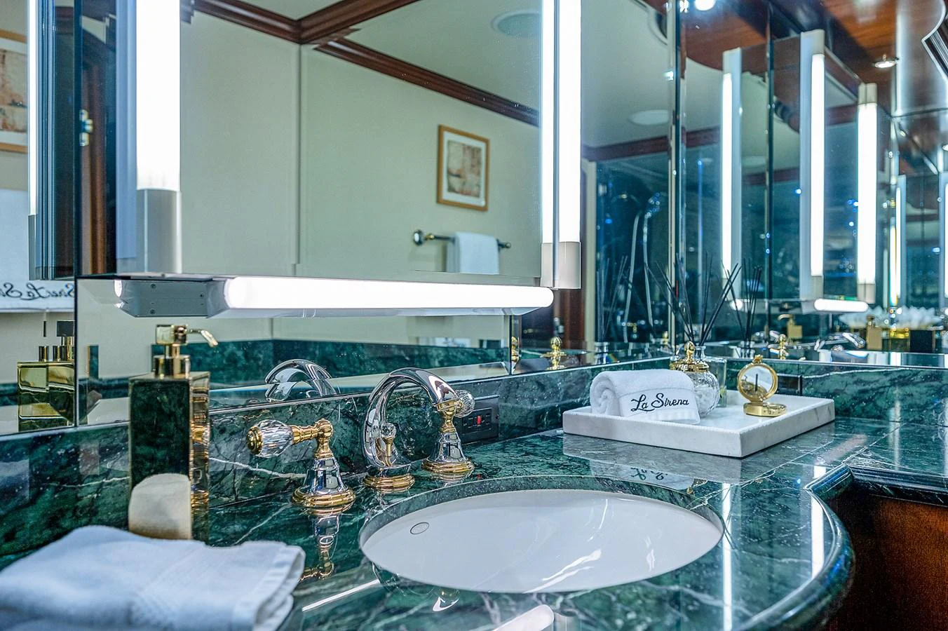 a bathroom with a large mirror aboard LA SIRENA Yacht for Sale