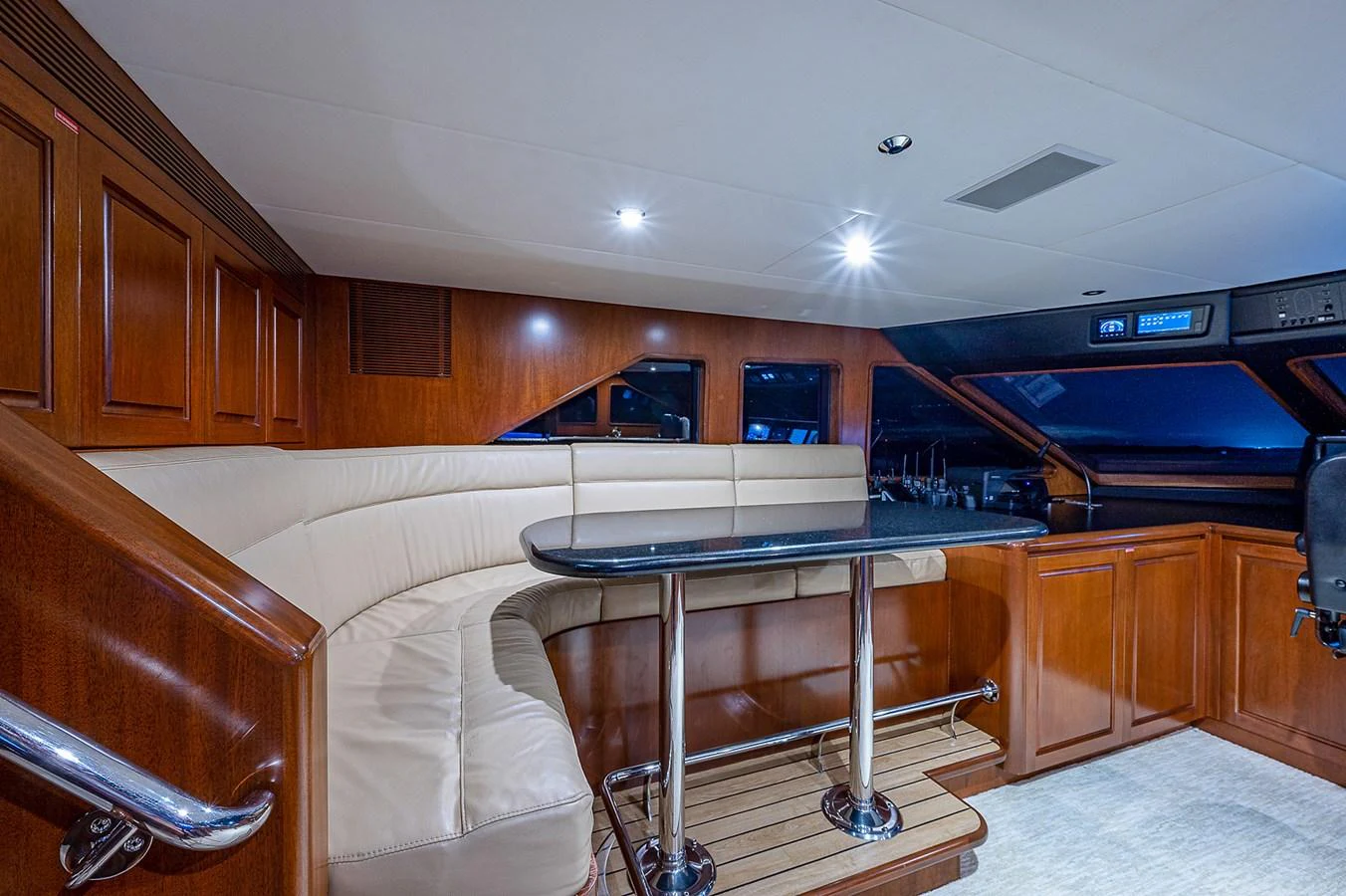 a bar and pool table in a room with wood cabinets aboard LA SIRENA Yacht for Sale