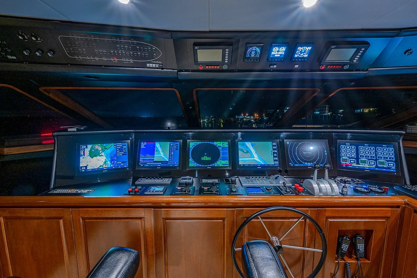 a control panel with many screens aboard LA SIRENA Yacht for Sale