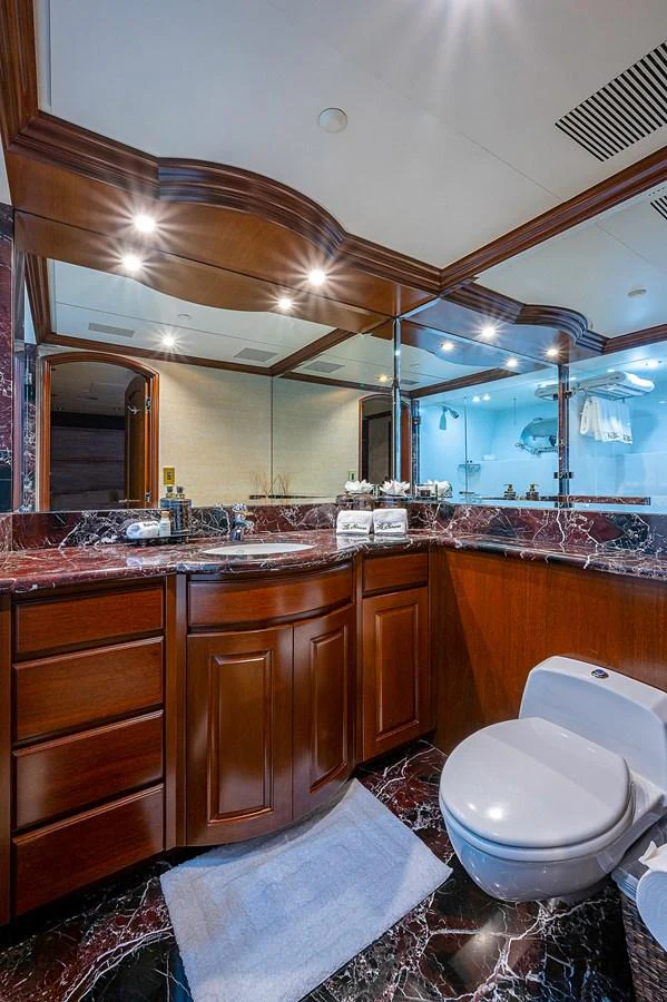 a bathroom with a large mirror aboard LA SIRENA Yacht for Sale