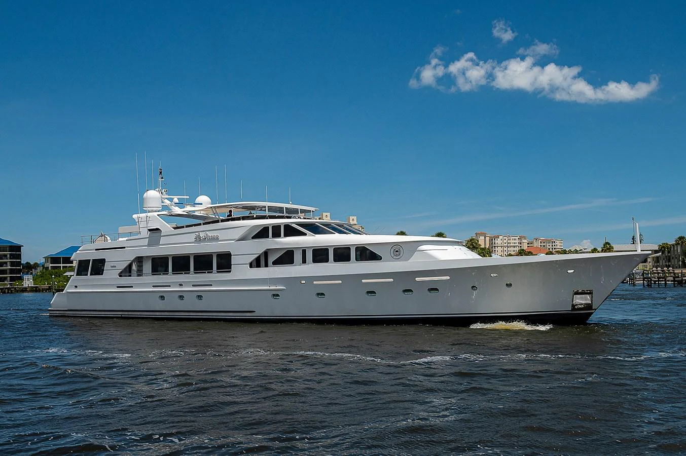 a large white boat on the water aboard LA SIRENA Yacht for Sale