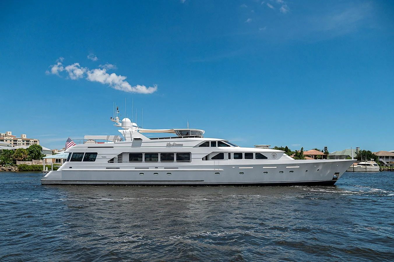a large white boat in the water aboard LA SIRENA Yacht for Sale