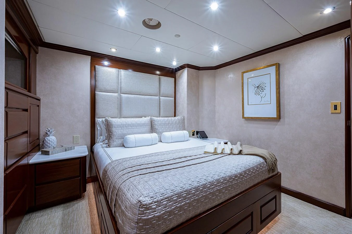 a large bedroom with a bed aboard LA SIRENA Yacht for Sale